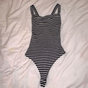 Never worn - stripped thong body suit